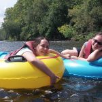 Photo of students tubing in the James River