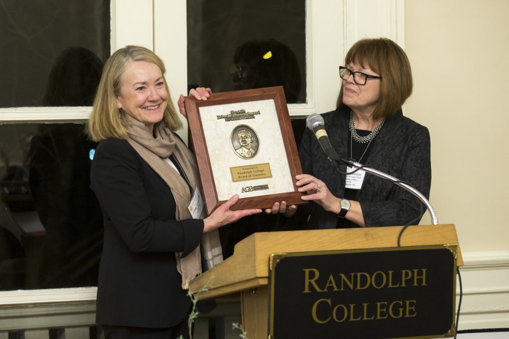 Cathy Havener Greer '73 (left), chair of the Randolph College Board of Trustees, accepts the award from Susan Johnston, executive vice president and COO of the AGB.