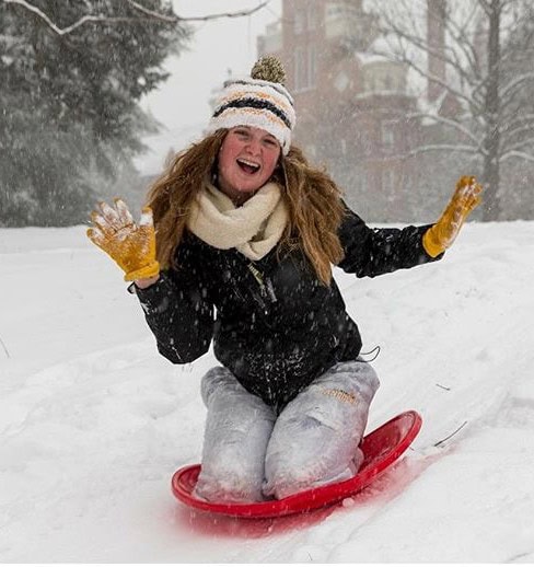 Sledding on front campus during Snow Day 2016.
