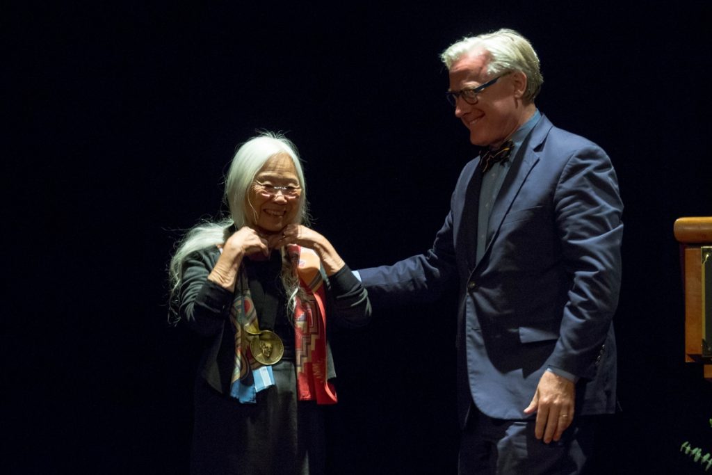 President Bradley W. Bateman presents the Pearl S. Buck Award to Maxine Hong Kingston.