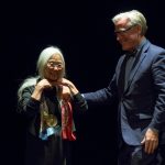 President Bradley W. Bateman presents the Pearl S. Buck Award to Maxine Hong Kingston.