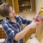 Sophia Dill '18 extracting honey