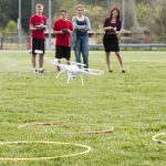 L-R: Keaton Ellis, James Dodson, Olivia Moore, and teacher Caitlin Unterman practice flying and landing a drone during coursework on a mock mission to Mars in Ms. Unterman's 8th grade science class on Thursday, April 21, 2016 in Forest, Va. The students are planning a simulated mission to Mars and are even getting help from NASA scientists. (Photo by Jay Westcott/The News & Advance)