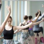 Dancers warming up in the studio