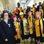 Seniors dress in robes and hats for convocation.
