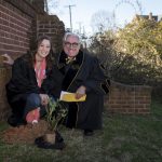 Erin McClelland '17 and President Bateman plant a rose on front campus, as is custom for the Founders' Day tradition.