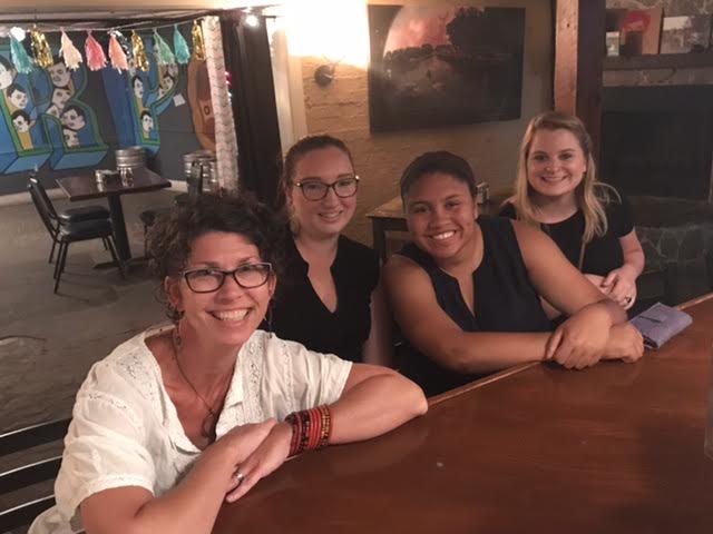 (From left) Maier education curator Laura McManus, office manager and public engagement coordinator Danni Schreffler, Stacey Samuels '18, and Maddie Shelby '18 (From left) Maier education curator Laura McManus, office manager and public engagement coordinator Danni Schreffler, Stacey Samuels '18, and Maddie Shelby '18