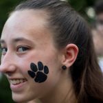 New student with WildCat paw print tattoo