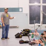 Head coach Taylor Steele talks to his men