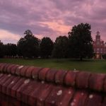 Sunset over Main Hall and the Red Brick Wall