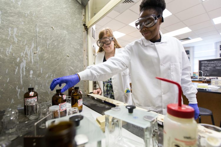 Chemistry professor Ann Fabirkiewicz and Drucilla Williams '18 work on their 2017 Summer Research project, Chemistry professor Ann Fabirkiewicz and Drucilla Williams '18 work on their 2017 Summer Research project,