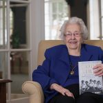 Dorothy Braden Bruce ‘42 holds a copy of the recently released book that details her previously top secret experiences as a WWII codebreaker for the U.S. Army.