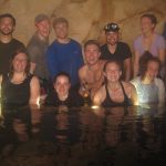 Edwards and the team of researchers in a partially underwater cave