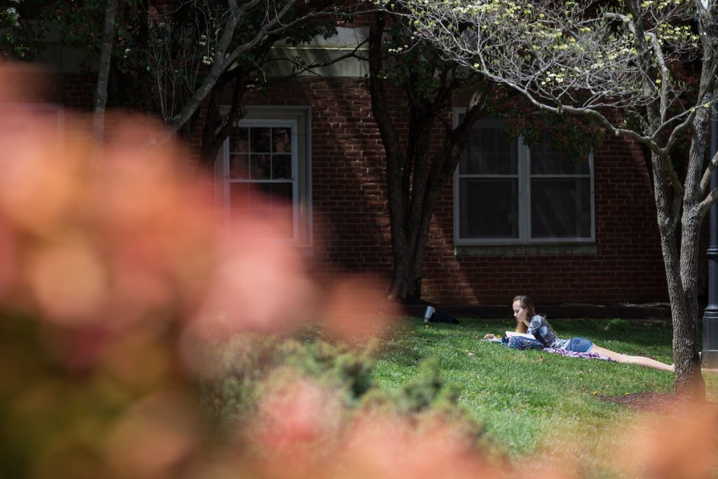 Studying outdoors on an 80-degree spring day