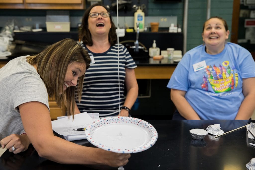 Teachers do an experiment on the viscosity (resistance of flow) of fluid in volcanos