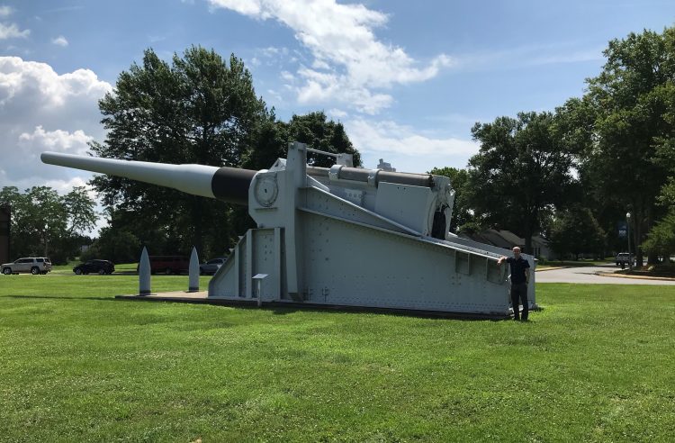 Alex Clem '19 stands next to a cannon used on a ship in WWII. Alex Clem '19 stands next to a cannon used on a ship in WWII.