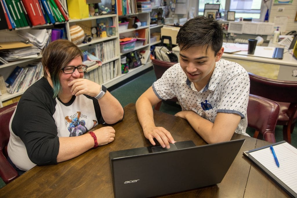 Physics professor Katrin Schenk and Emad Davis '19 work to develop their web application to help caregivers monitor Alzheimer's patients