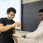 Students stack metal nuts in a task aimed at teaching arousal regulation, which helps teach breathing techniques to improve performance on fine motor skills. The activity was part of professor Meghan Halbrook’s Sport Psychology class.