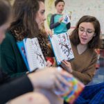 Faith Powell ’18 and Lydia Hamd ’18 read The Cat in the Hat to students at James River Day School.