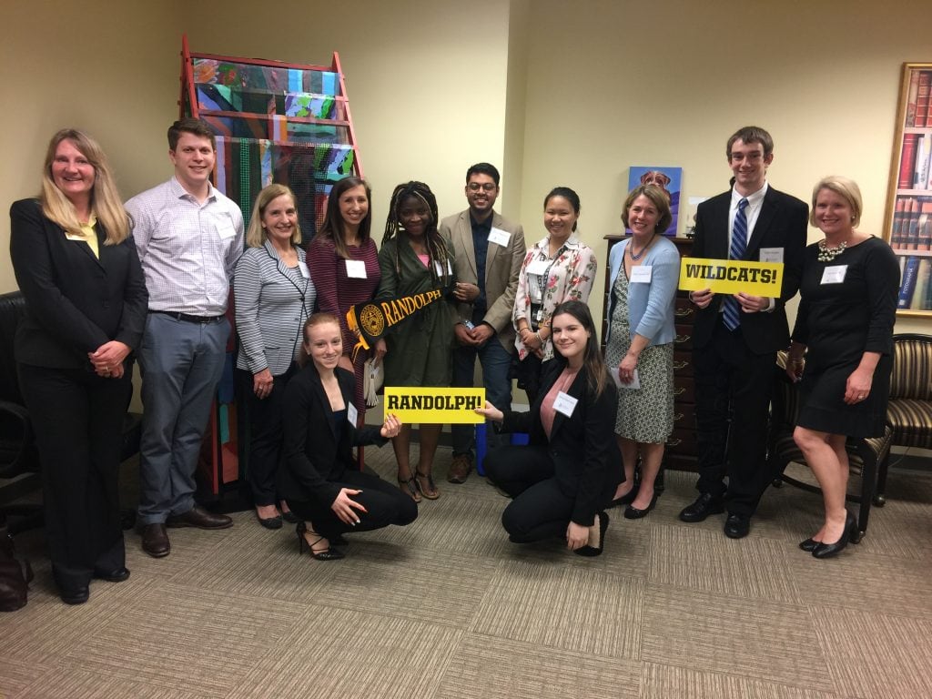 Students and alumni show their school pride during the career immersion trip to Richmond, Va.