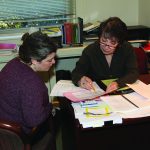 Wallace working with a colleague in 2011