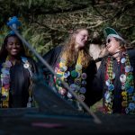 Seniors sing traditional songs around the Sundial
