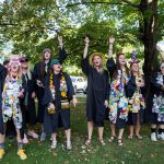 Seniors sing around the Sundial