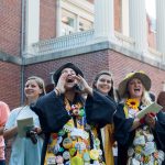 Seniors sing around the Sundial