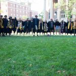 Seniors sing around the Sundial