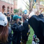 Seniors sing around the Sundial