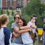 Alumnae embrace at Homecoming