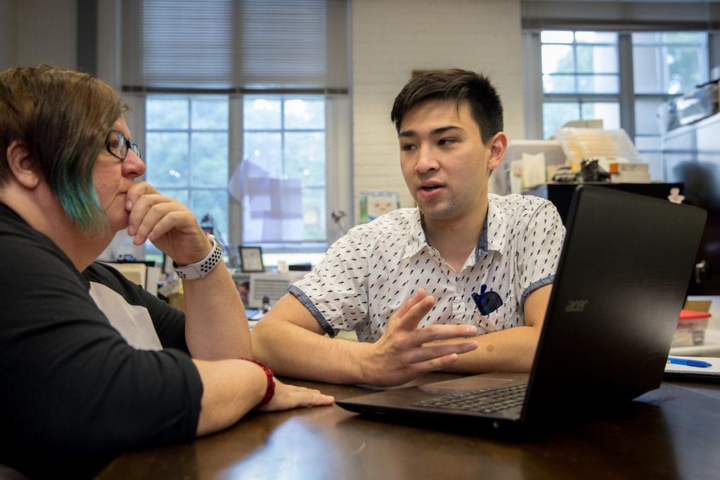 Physics professor Katrin Schenk and Emad Davis '19 collaborate on the project to develop software that helps caregivers monitor Alzheimer's patients