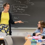 Philosophy professor Kaija Mortensen interacts with Olivia Chapin ’22 during a classroom discussion about the meaning of Vita abundantior.