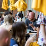 M.F.A. students discuss their work over lunch.