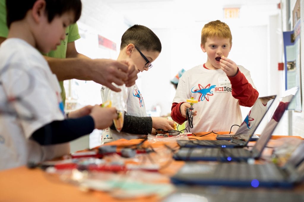 Participants in the 2018 Science Festival work on computers