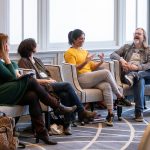 A panel discussion from Randolph College MFA faculty takes place during the winter residency program.