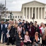 Randolph students with Rashan Colbert '11 in front of the Supreme Court building in Washington, D.C.