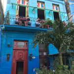 People on a balcony of a Cuba building