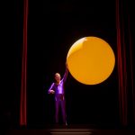 Physics professor Peter Sheldon blows up a balloon and goes inside it.