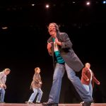 The "Backstreet Campus Boys" perform a dance routine