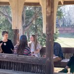 Professor Kaija Mortensen teaches class in the gazebo on front campus