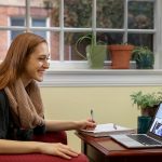 Student talking to professor through a chat window on a laptop