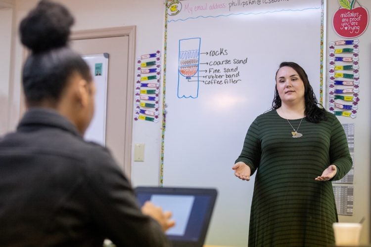 Michaela Phillips teaching science at the Empowerment Academy.