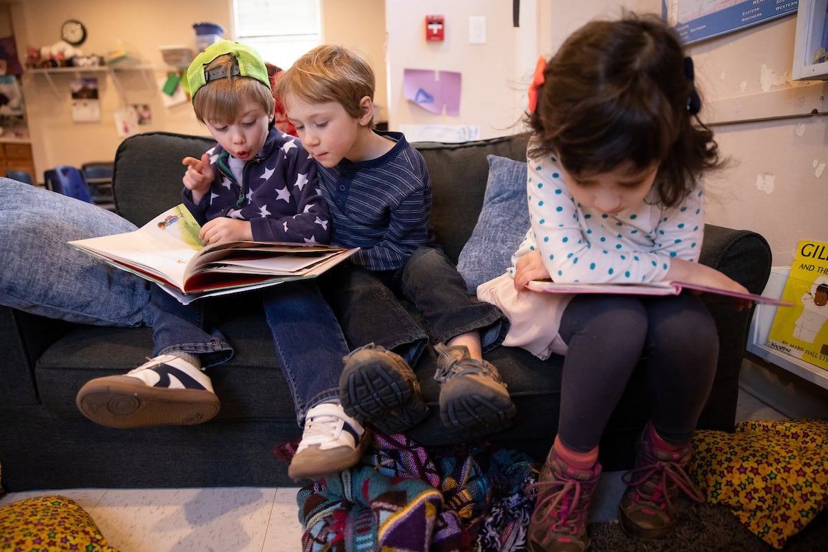 Randolph College Nursery School students read together