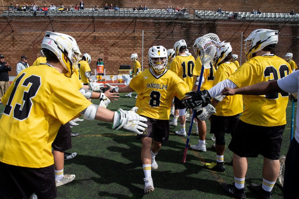 The WildCat men get ready for a lacrosse game versus Methodist