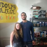 Student volunteers Madeline Owens '20 and Avery Payne '21 helped cut the ribbon for the official opening of the Randolph College Food Pantry on Wednesday.