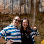 Students in front of a waterfall