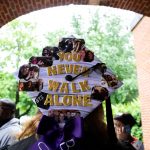 A hat that reads "You never walk alone"