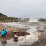 Students look at geysers in Hvolsvollur Park
