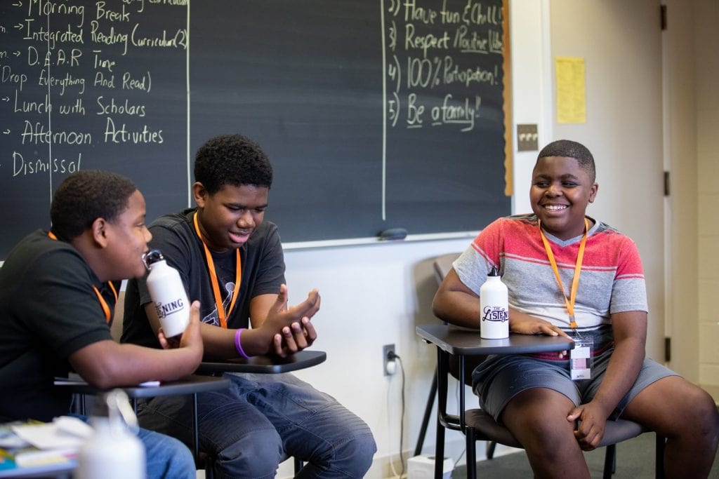 Students talk during an education session